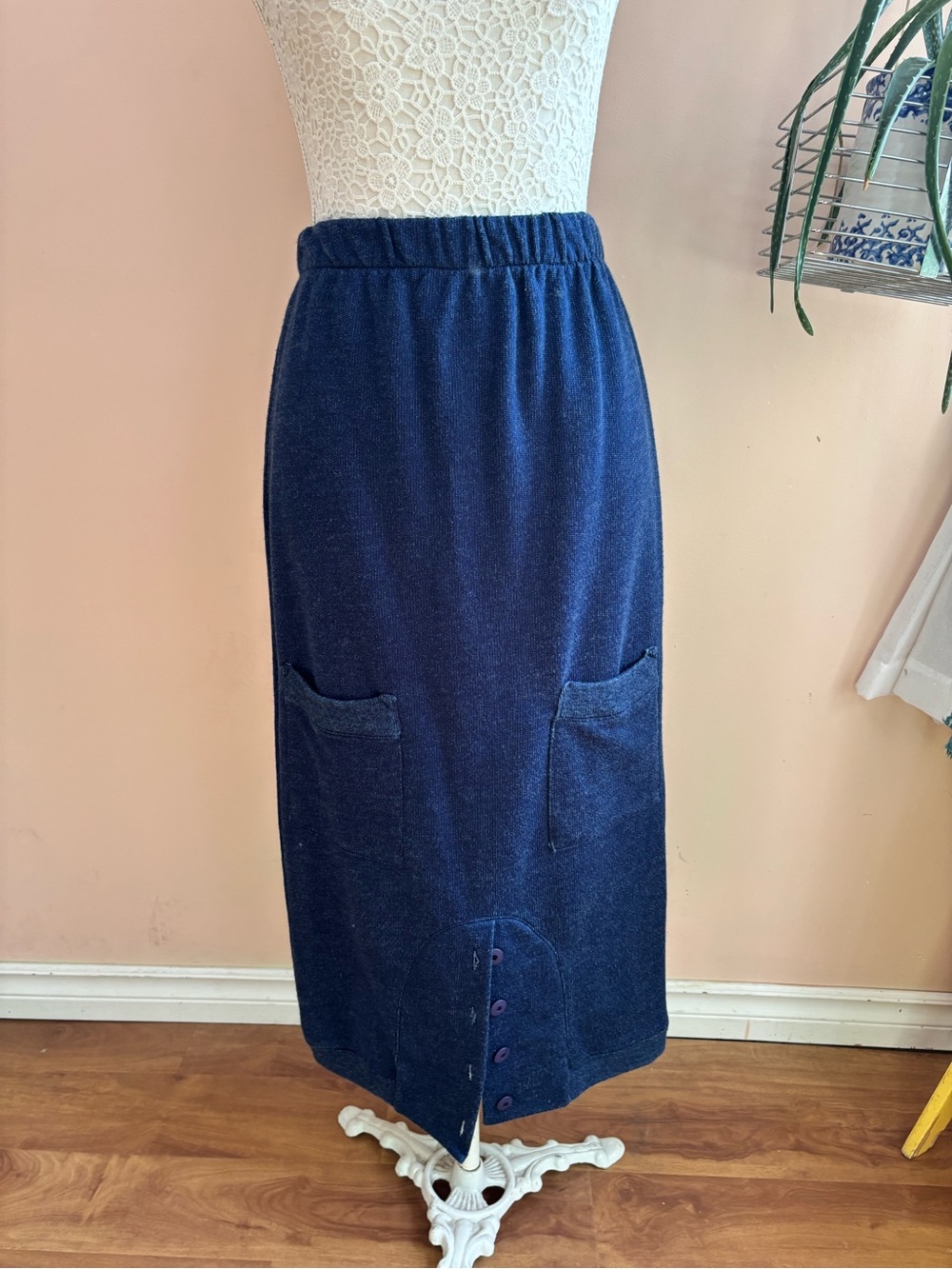 le chateau Navy Midi Knit Skirt with Front Button Hem and Patch Pockets